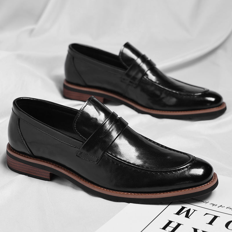 Men's polished penny loafers with rounded toes, low heels and layered soles