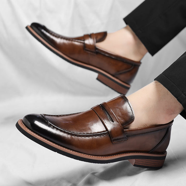 Men's polished penny loafers with rounded toes, low heels and layered soles