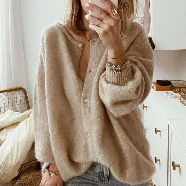 Women's beige button front knit cardigan with long sleeves