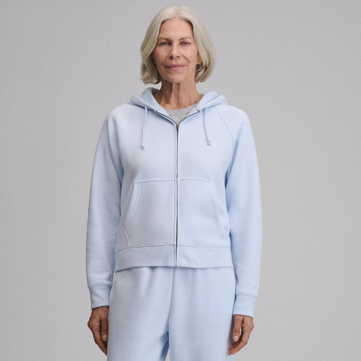 Women's full-zip hooded sweatshirt with long sleeves and front pockets