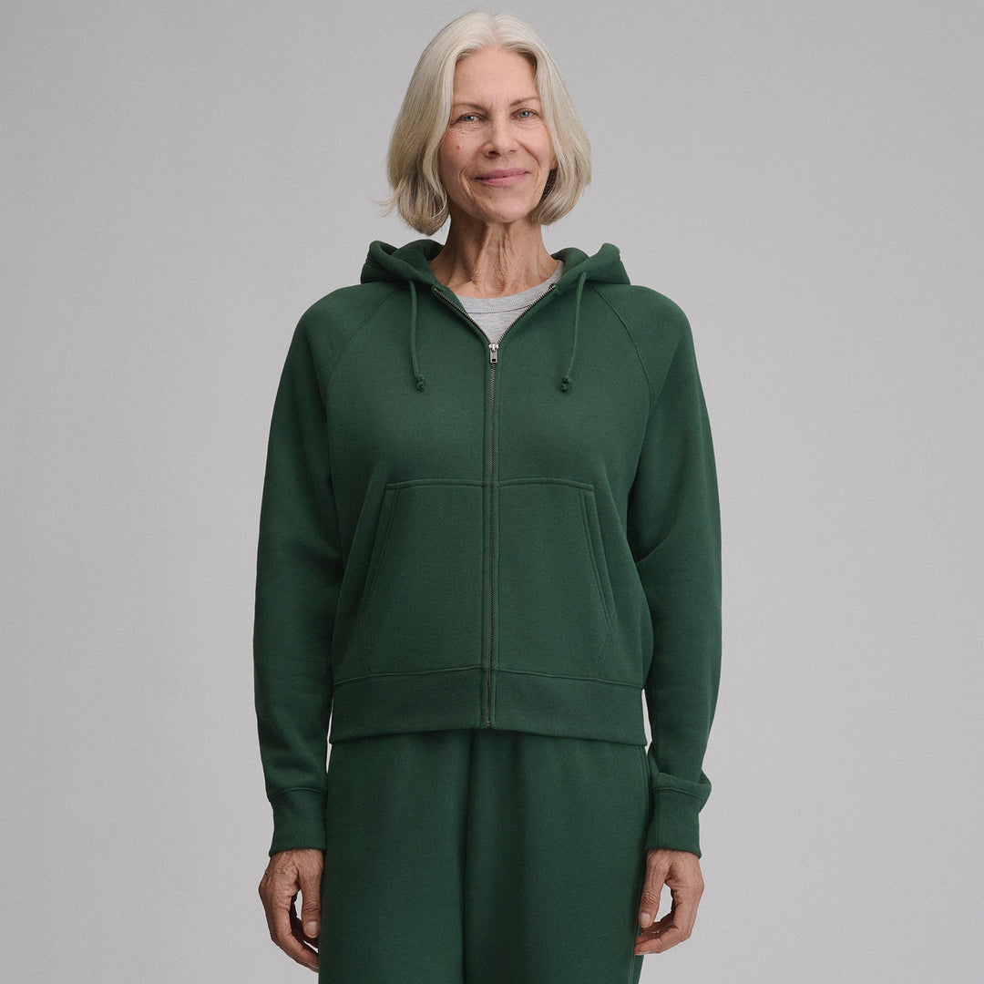 Women's full-zip hooded sweatshirt with long sleeves and front pockets