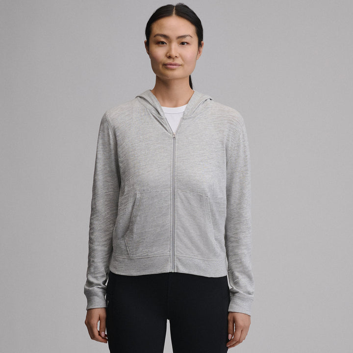 Women's hooded full-zip sweatshirt with long sleeves and front pockets