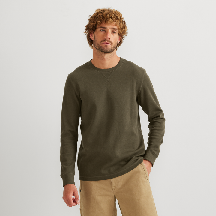Men's long sleeve crew neck top with fine ribbed texture and cuffed sleeves