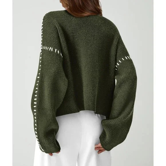 Women's knitted sweater with contrast stitch detailing on the sleeves