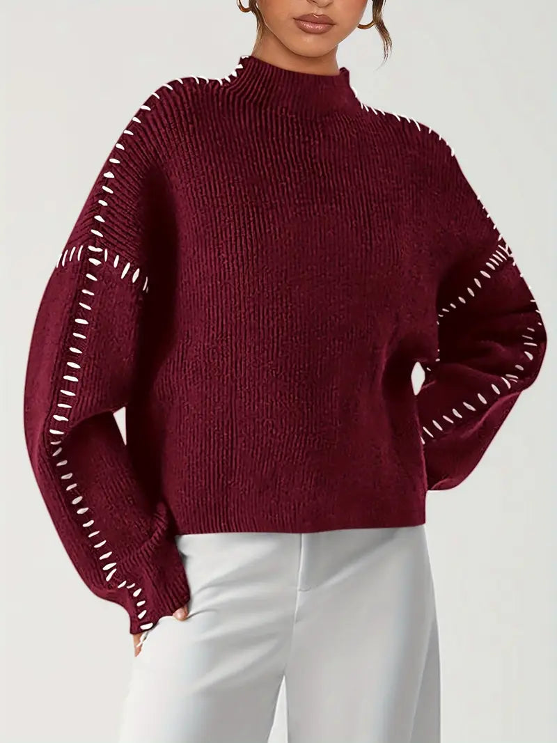 Women's knitted sweater with contrast stitch detailing on the sleeves