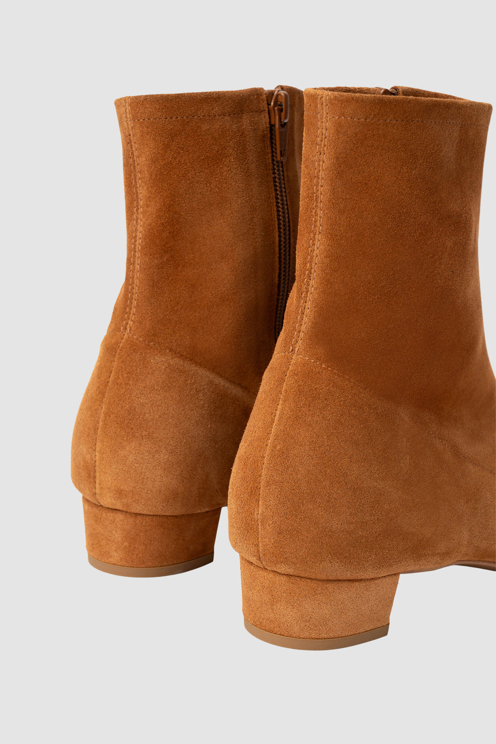 Tan ankle boots with pointed toe and low block heel