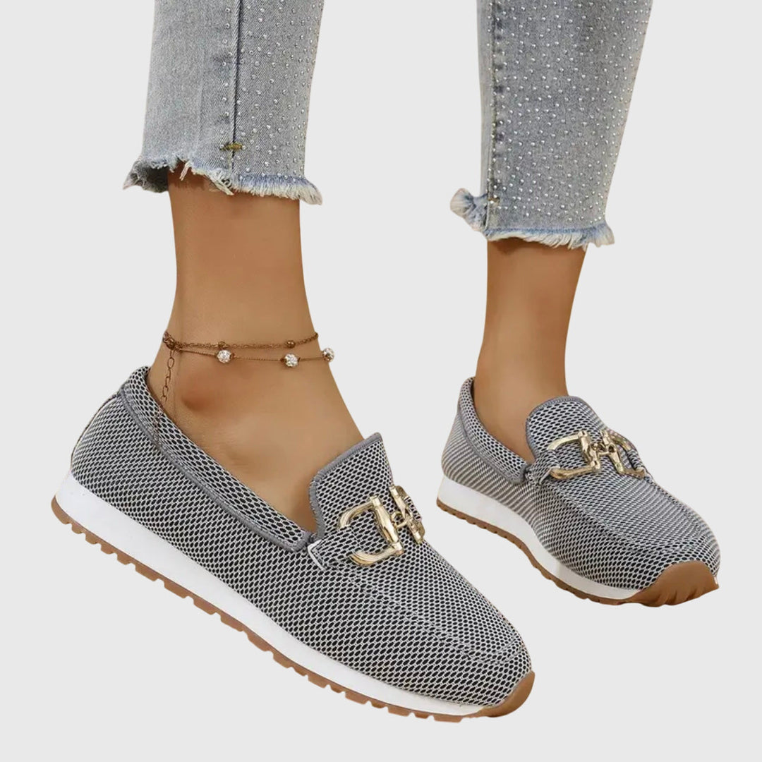 Women's textured slip-on loafers with round toes and metal details