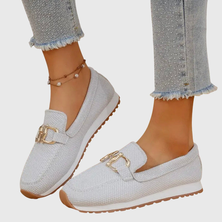 Women's textured slip-on loafers with round toes and metal details