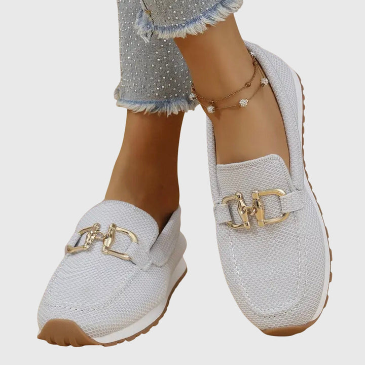 Women's textured slip-on loafers with round toes and metal details