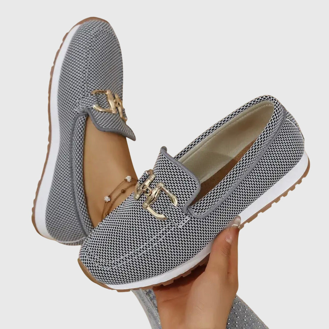 Women's textured slip-on loafers with round toes and metal details