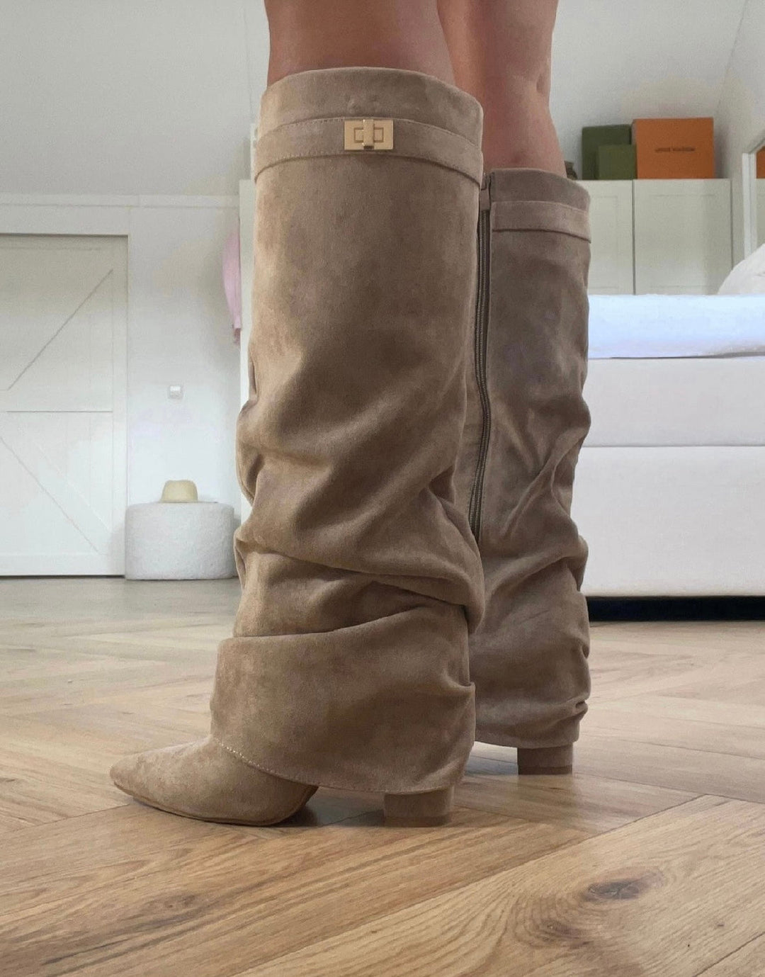 Women's khaki slouch boots with buckle band detail, side zip, and gathered shaft