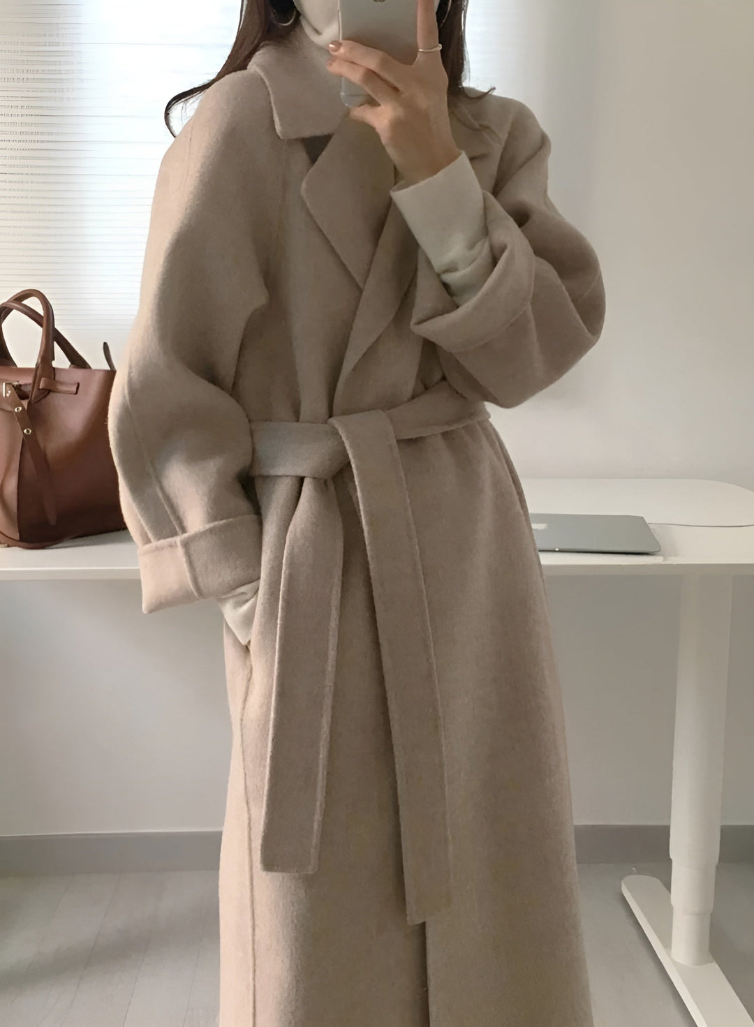 Women's long wrap coat with lapels and waist tie