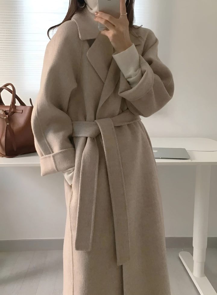 Women's long wrap coat with lapels and waist tie