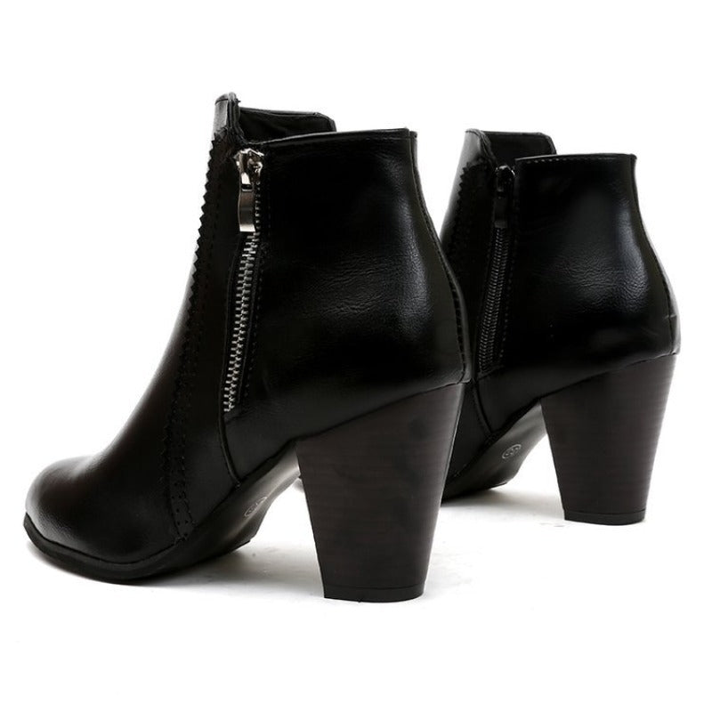 Women's heeled ankle boots with side zipper and almond toe