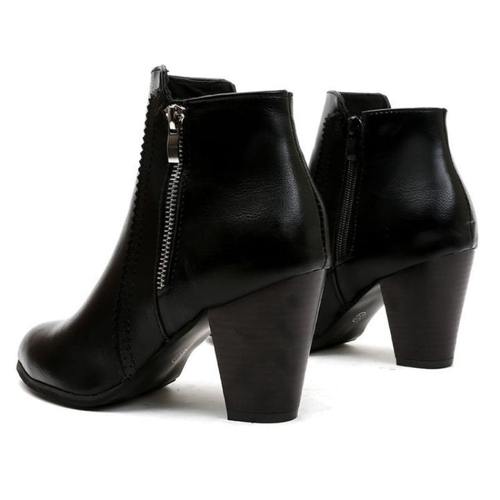Women's heeled ankle boots with side zipper and almond toe