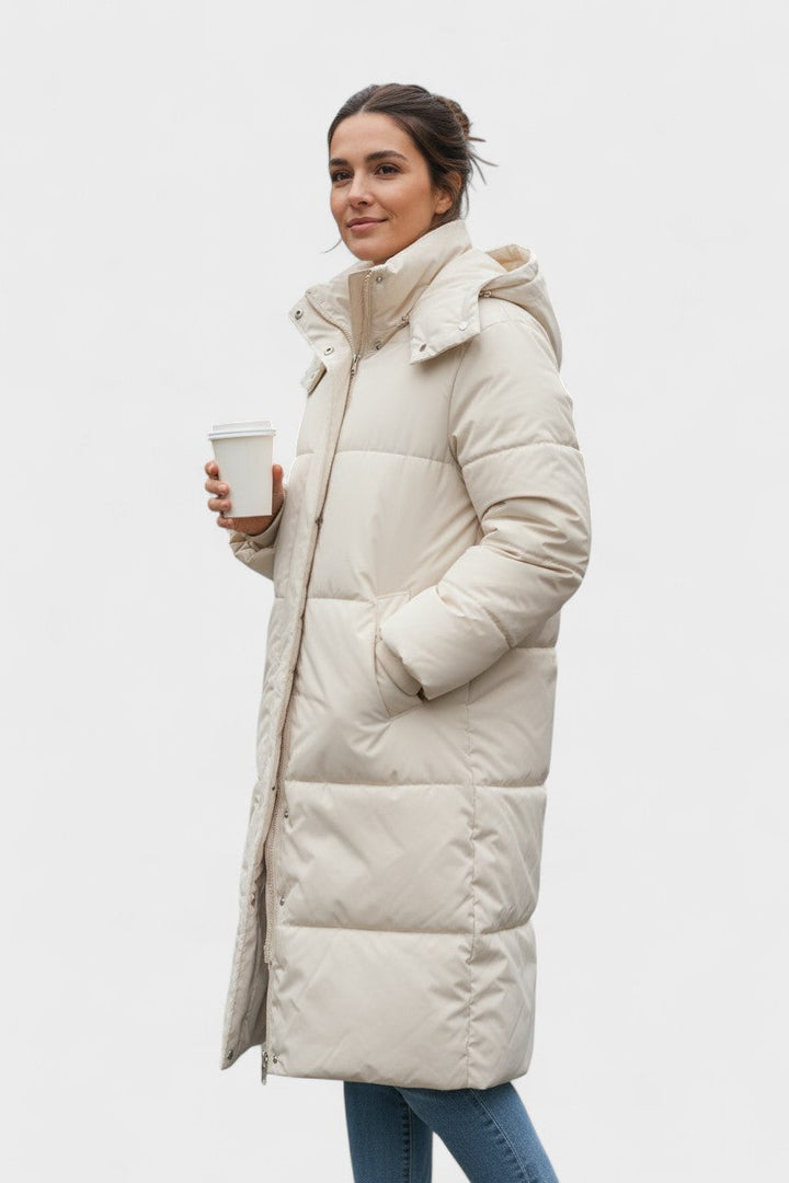 Longline hooded puffer coat with quilted panels and large pockets