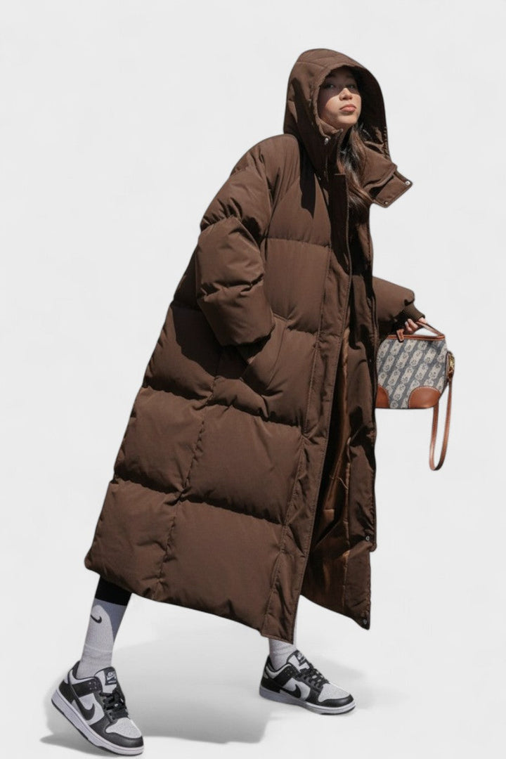 Longline hooded puffer coat with quilted panels and large pockets