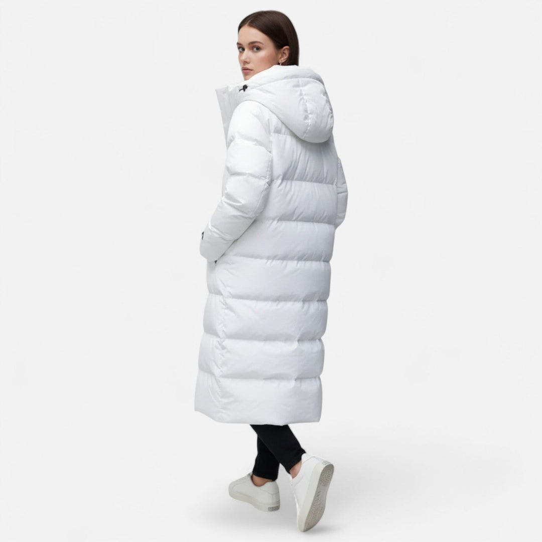Women's long quilted hooded puffer coat with zip front and pockets