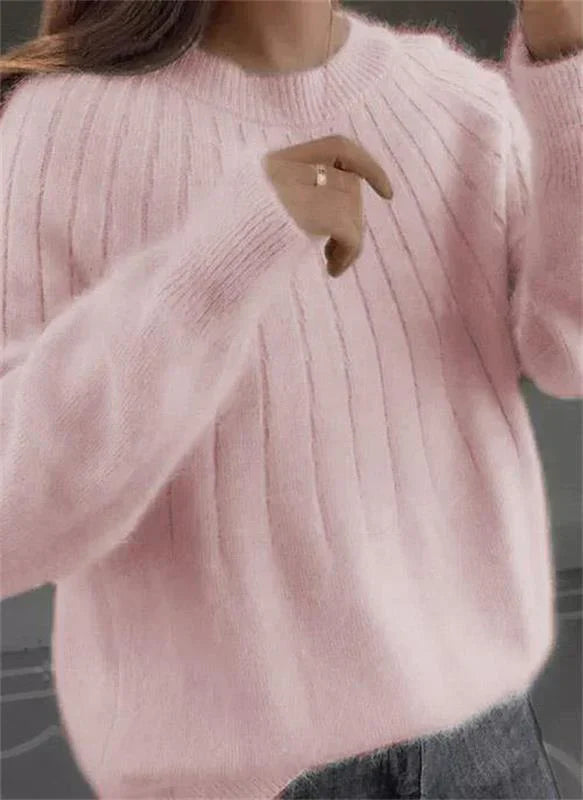 Women's ribbed crew neck jumper with long sleeves and relaxed hip-length fit