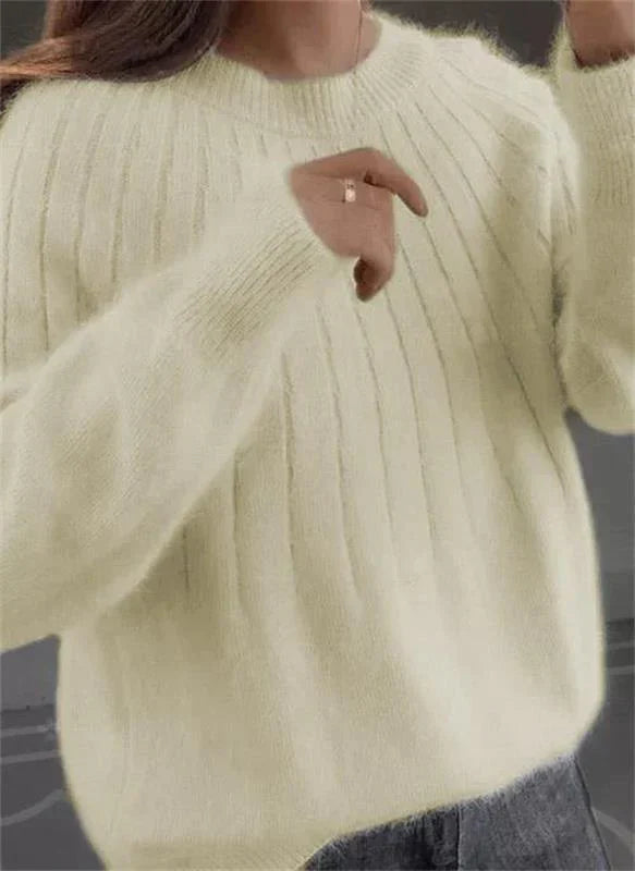 Women's ribbed crew neck jumper with long sleeves and relaxed hip-length fit