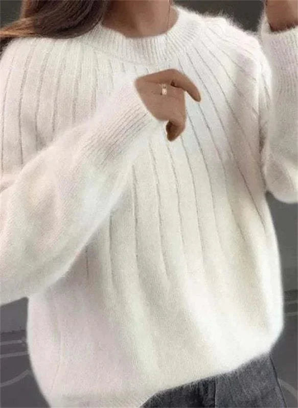 Women's ribbed crew neck jumper with long sleeves and relaxed hip-length fit