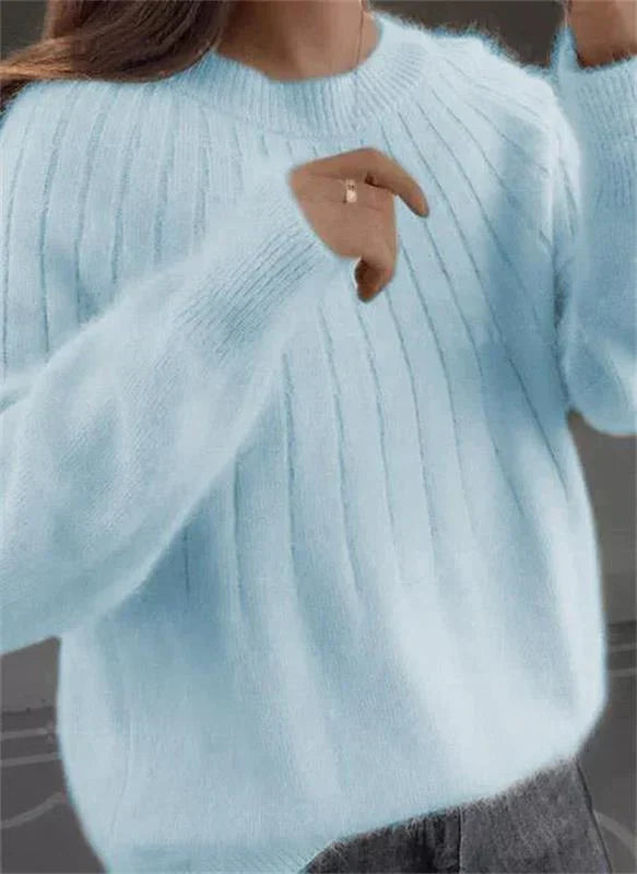 Women's ribbed crew neck jumper with long sleeves and relaxed hip-length fit