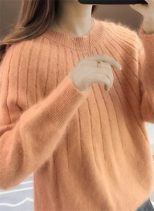 Women's ribbed crew neck jumper with long sleeves and relaxed hip-length fit