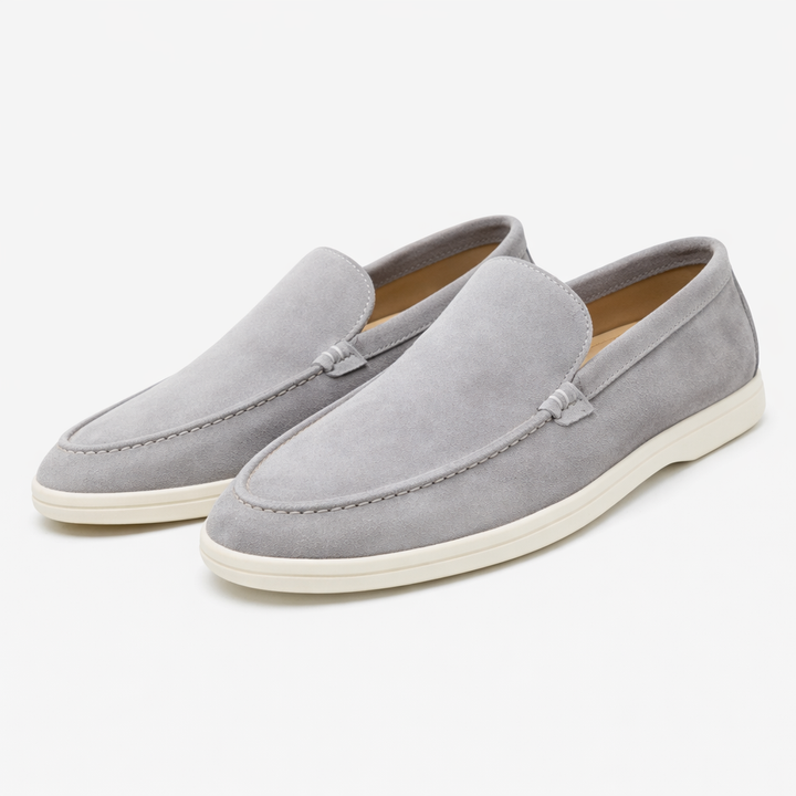 Men's burgundy Como loafer with cream sole and moccasin stitching, shown from the side