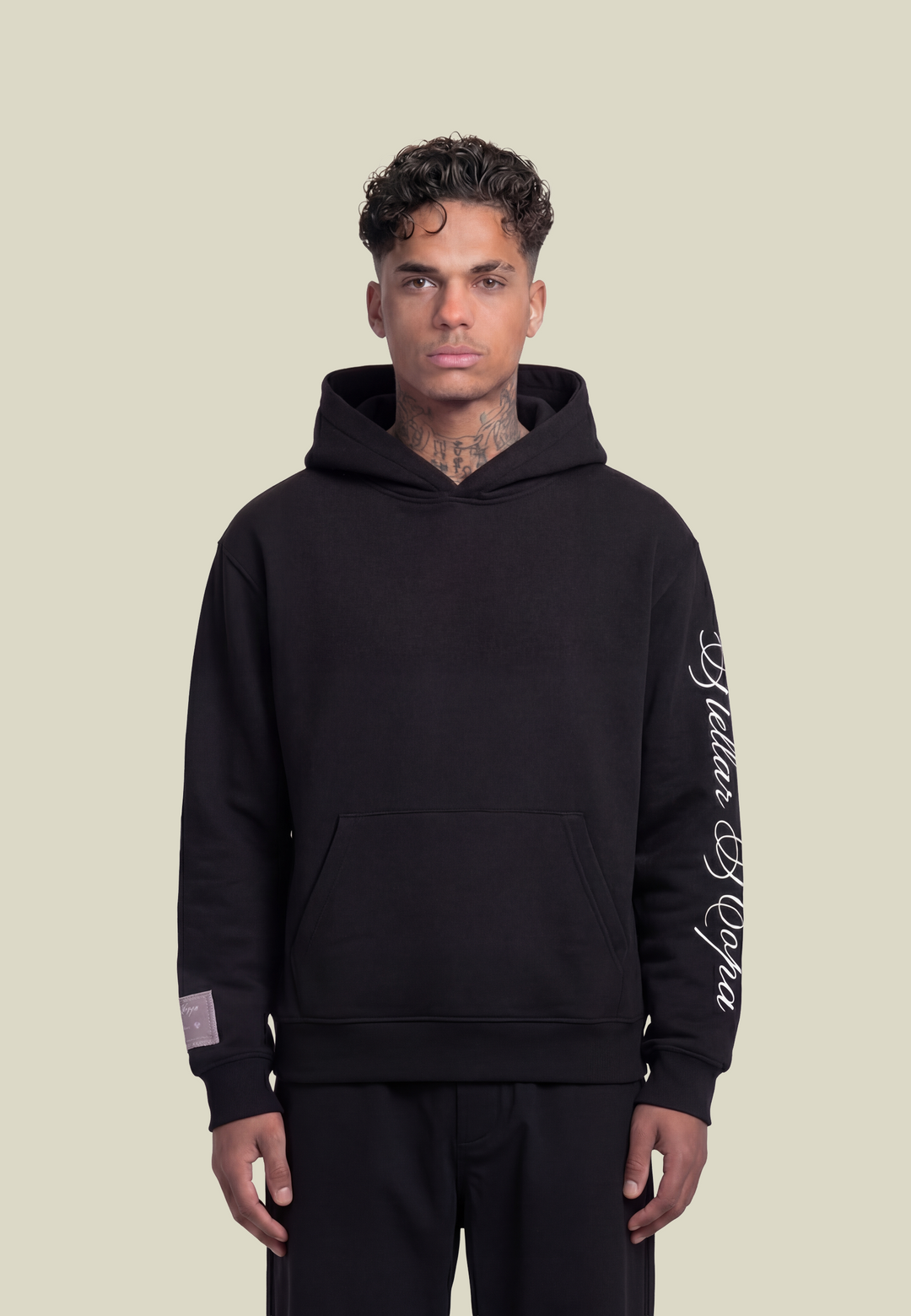 Black unisex hoodie with hood, front pouch pocket and white sleeve lettering