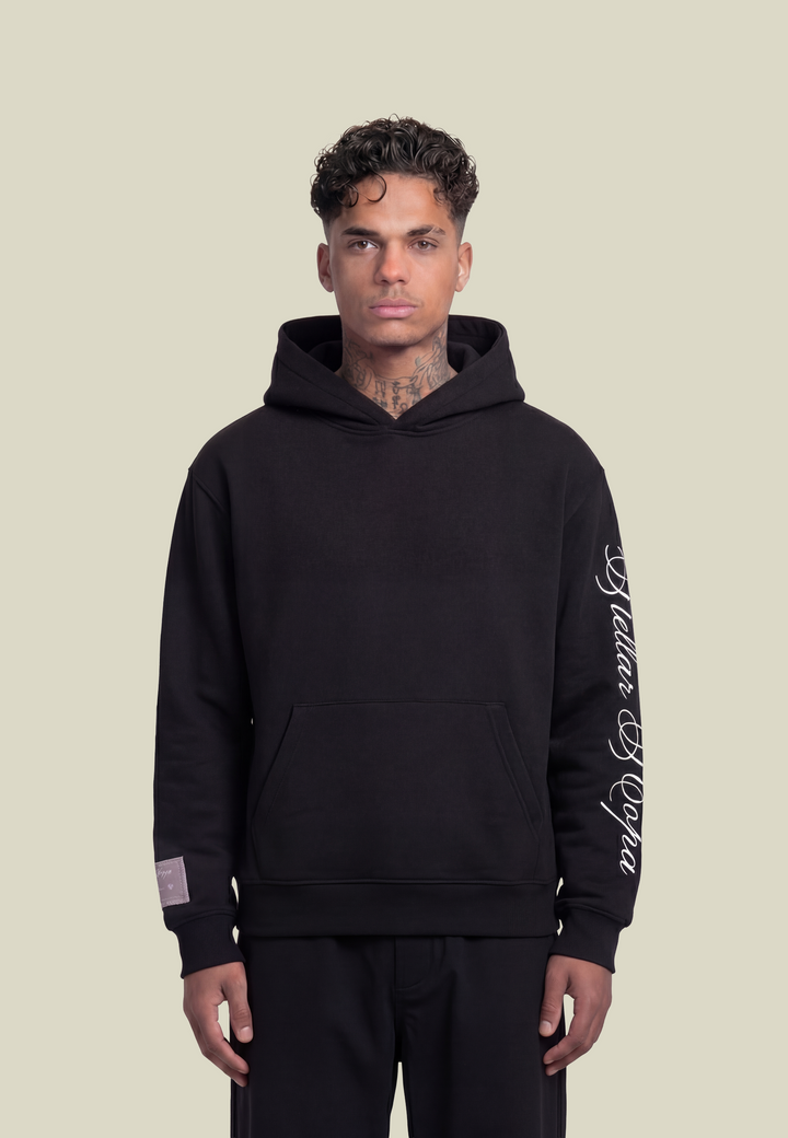 Black unisex hoodie with hood, front pouch pocket and white sleeve lettering