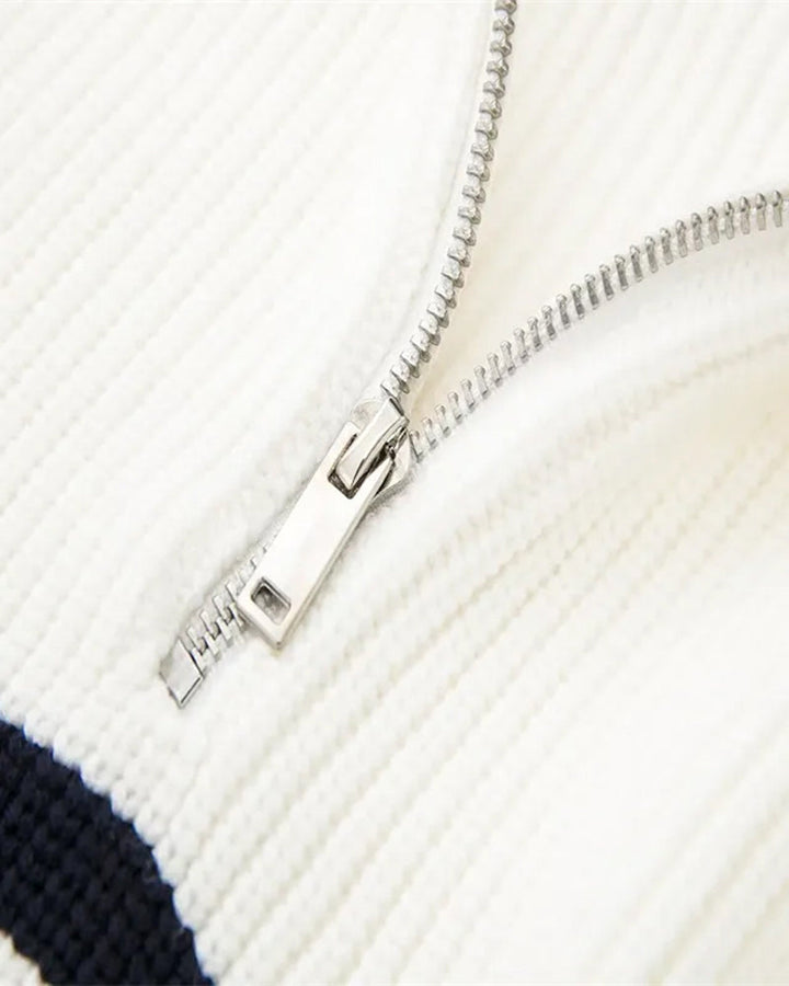 Striped ribbed jumper with mock neck and half-zip fastening