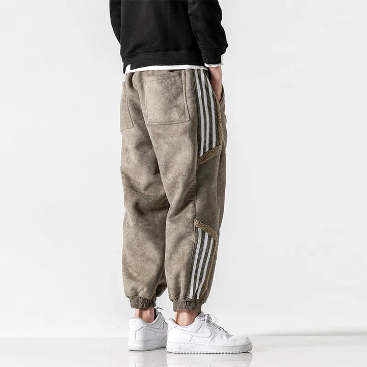 Men's jogger pants with contrasting side stripes and elastic cuffs