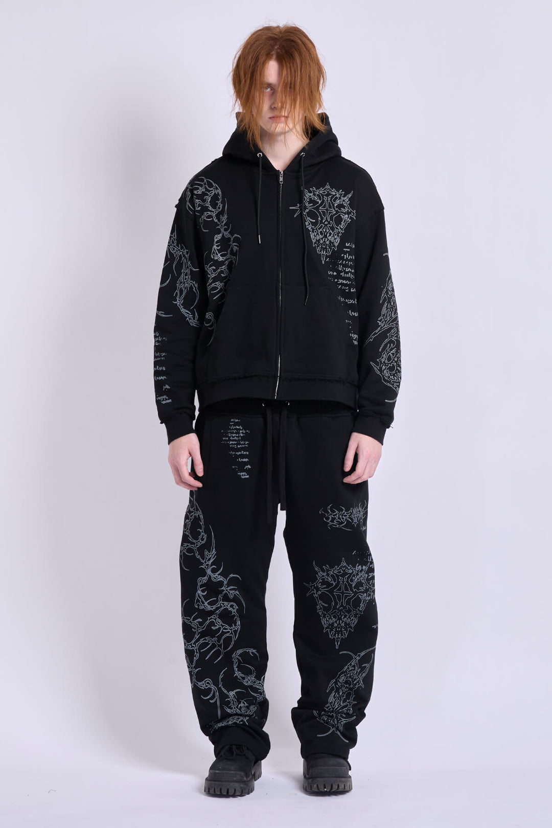 Black graphic zip hoodie with hood and printed motifs