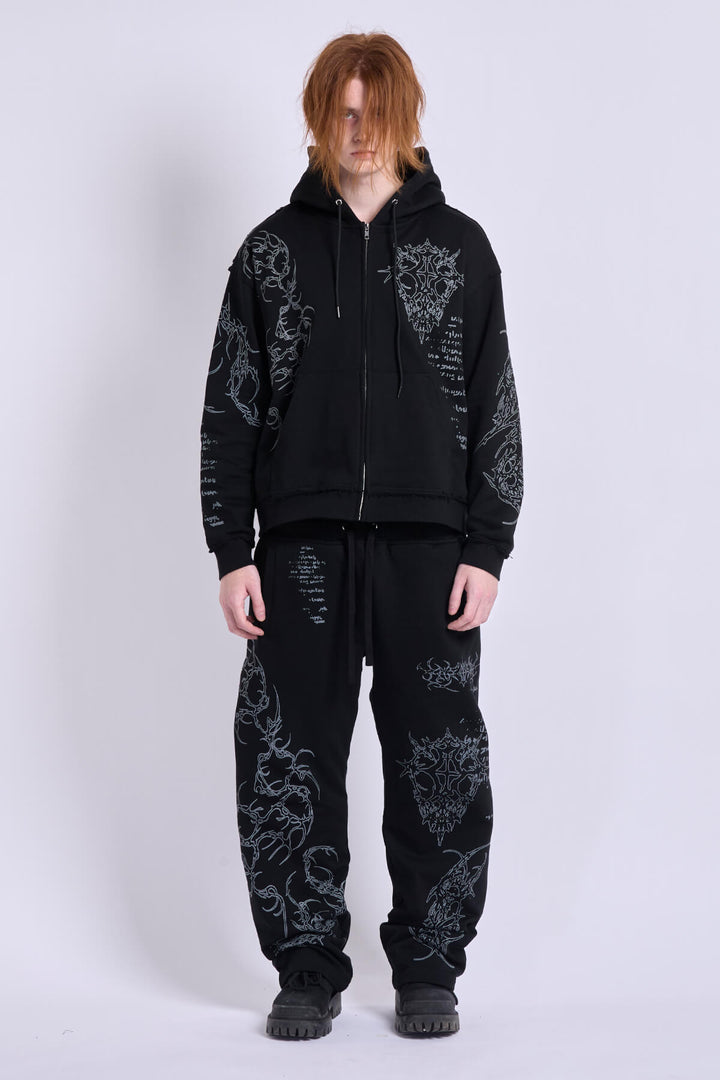 Black graphic zip hoodie with hood and printed motifs