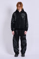 Black graphic zip hoodie with hood and printed motifs