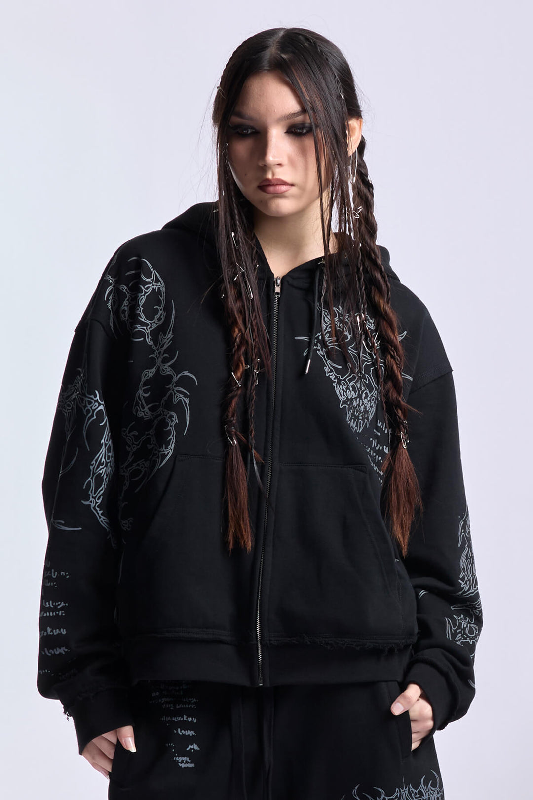 Black graphic zip hoodie with hood and printed motifs