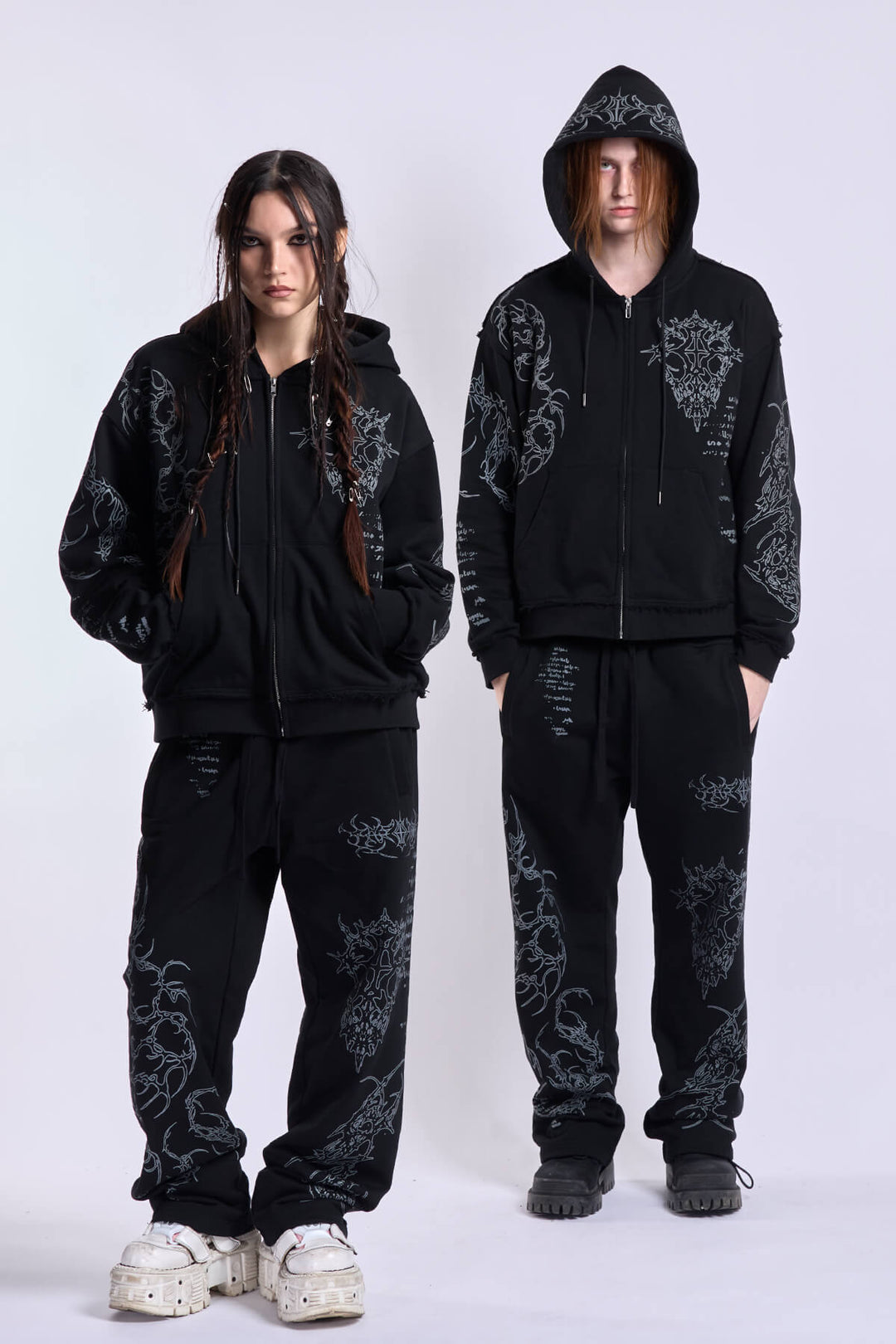 Black graphic zip hoodie with hood and printed motifs