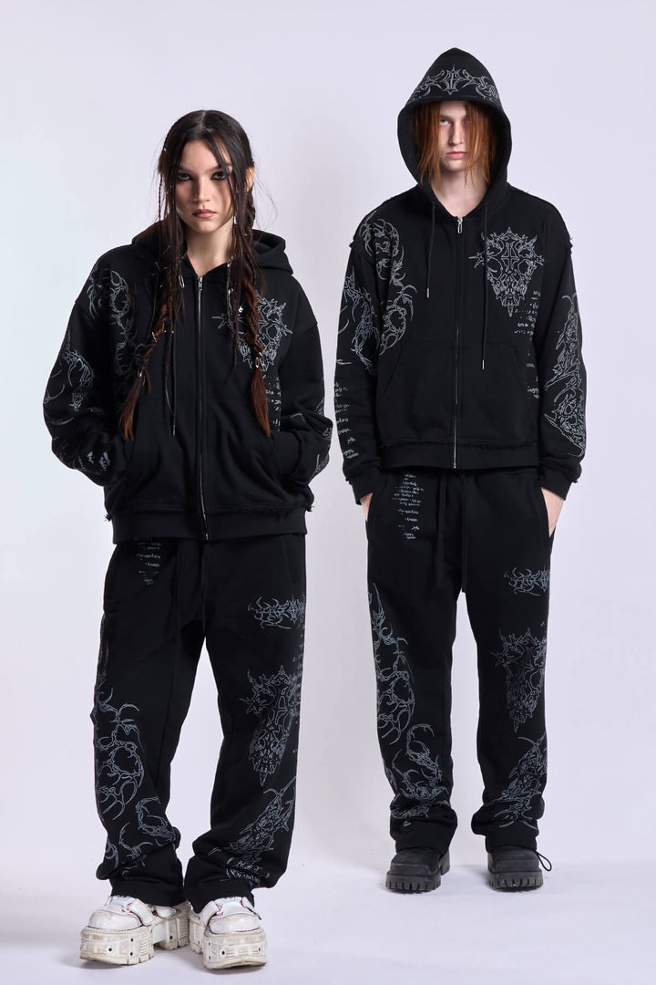 Black graphic zip hoodie with hood and printed motifs