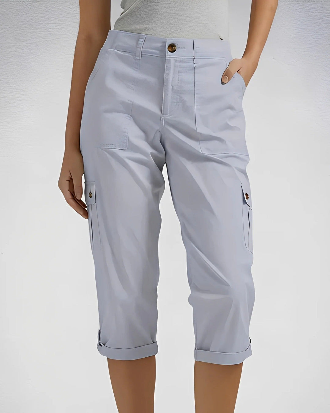 Women's cropped cargo trousers with cuffed hems and multiple pockets
