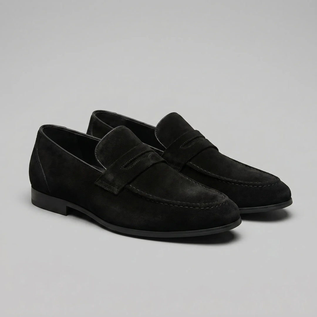 Men's penny loafers with almond toes, front straps and low flat heels