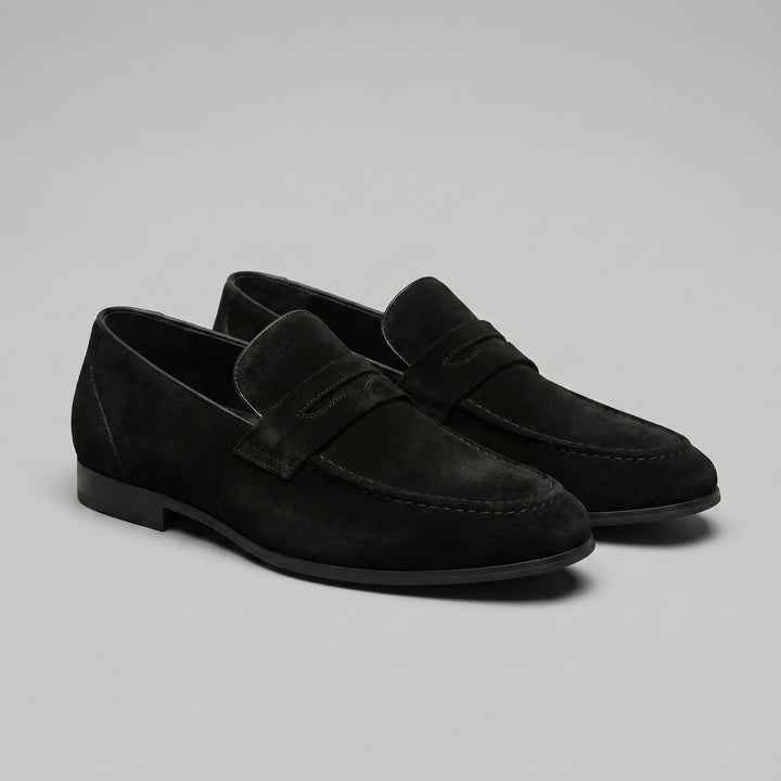 Men's penny loafers with almond toes, front straps and low flat heels