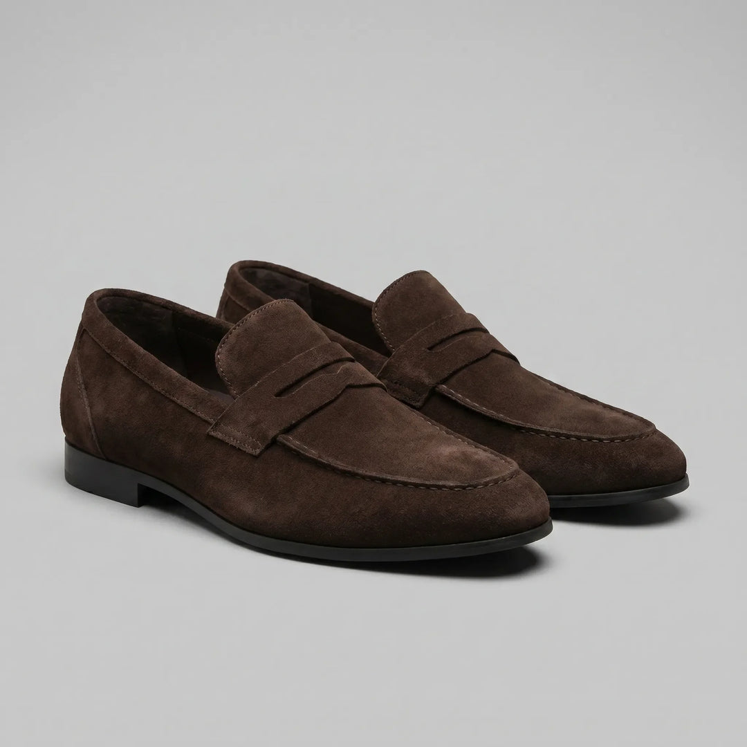Men's penny loafers with almond toes, front straps and low flat heels