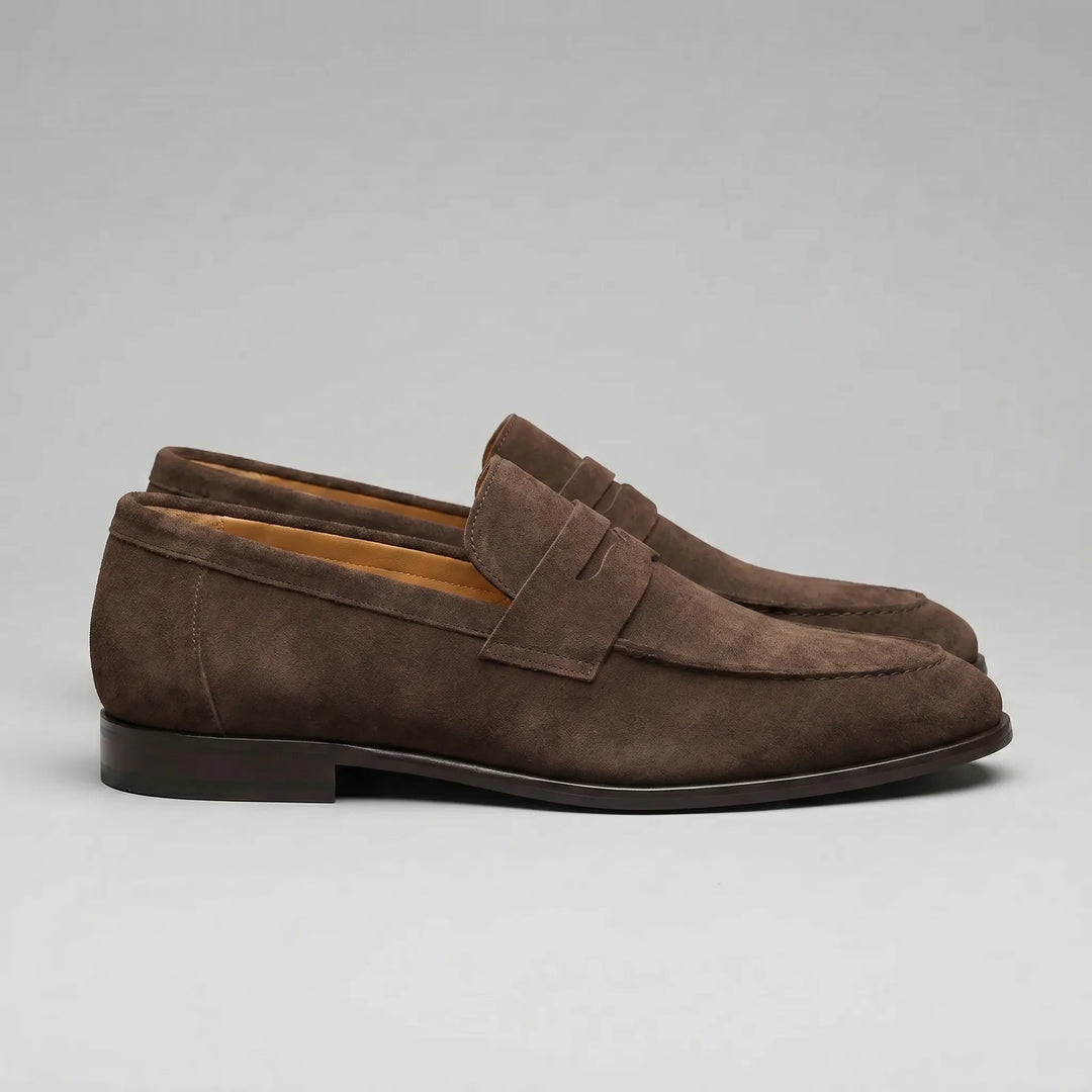 Men's penny loafers with almond toes, front straps and low flat heels
