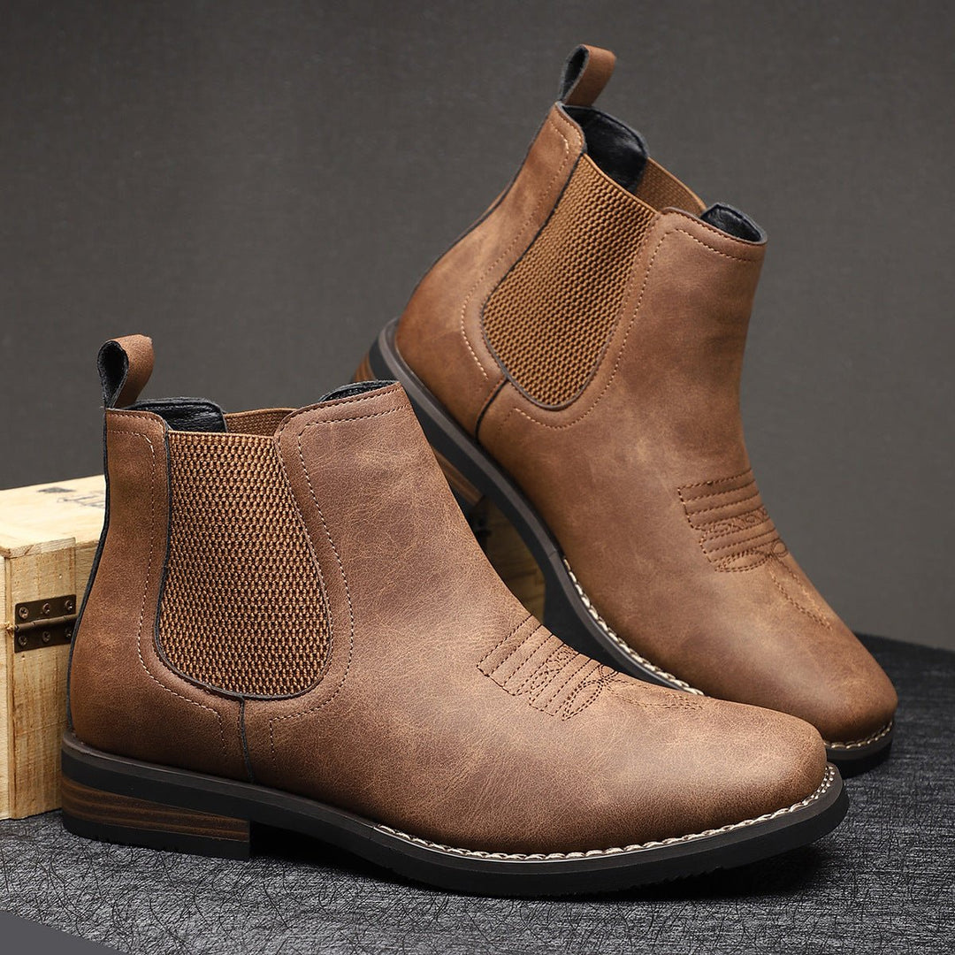 Men's brown Chelsea ankle boots with elastic side panels and low heels