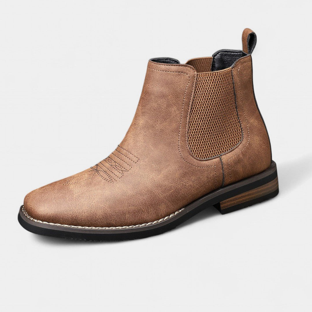 Men's brown Chelsea ankle boots with elastic side panels and low heels