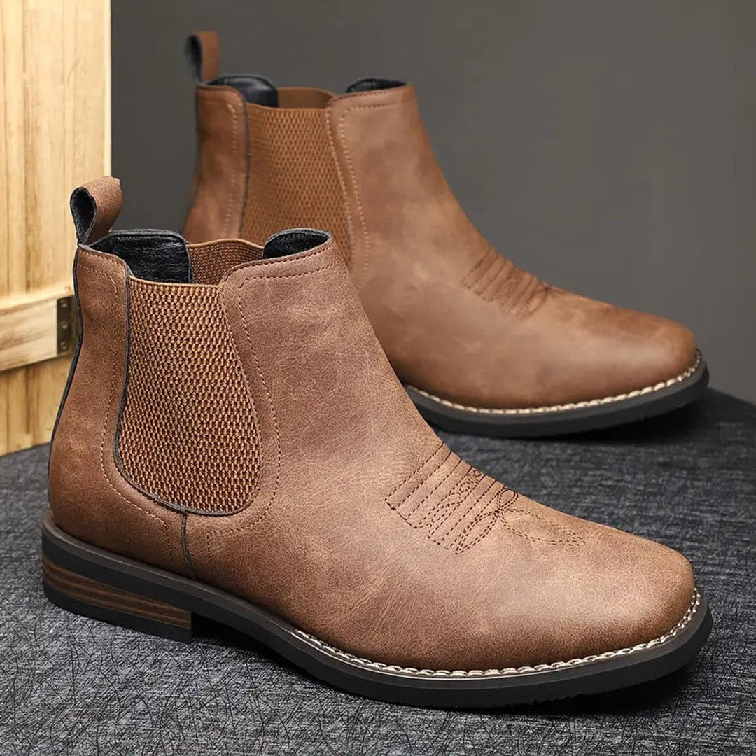 Men's brown Chelsea ankle boots with elastic side panels and low heels