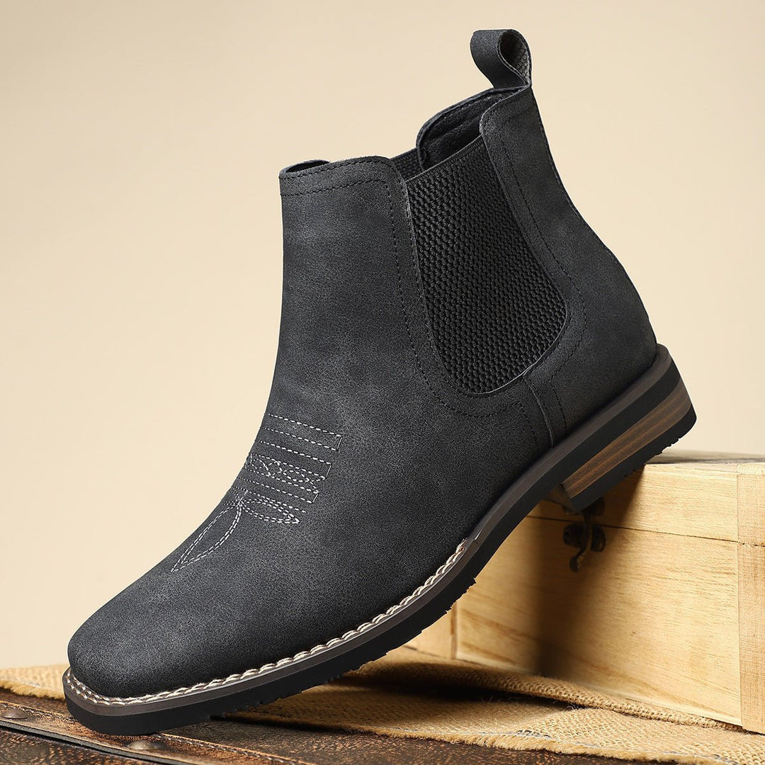 Men's brown Chelsea ankle boots with elastic side panels and low heels