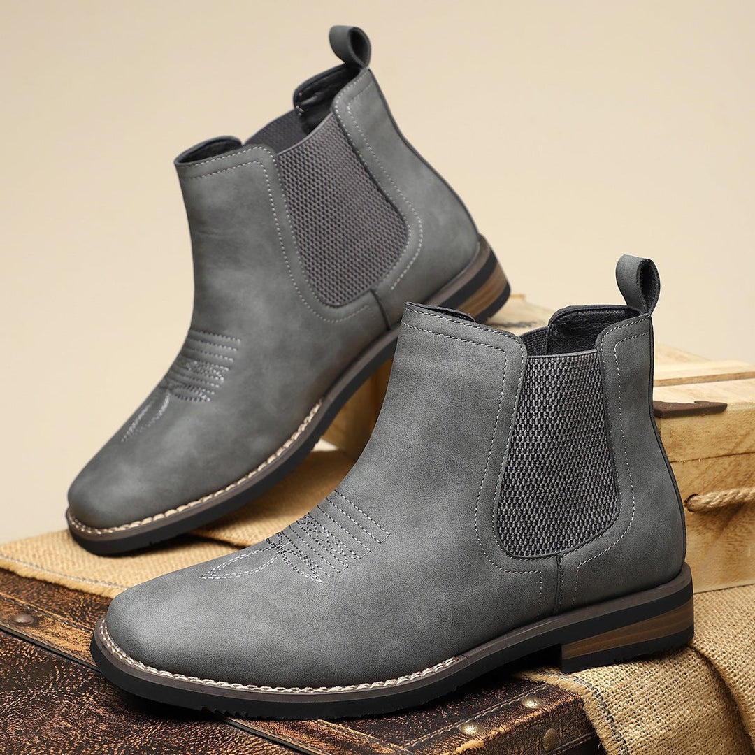 Men's brown Chelsea ankle boots with elastic side panels and low heels