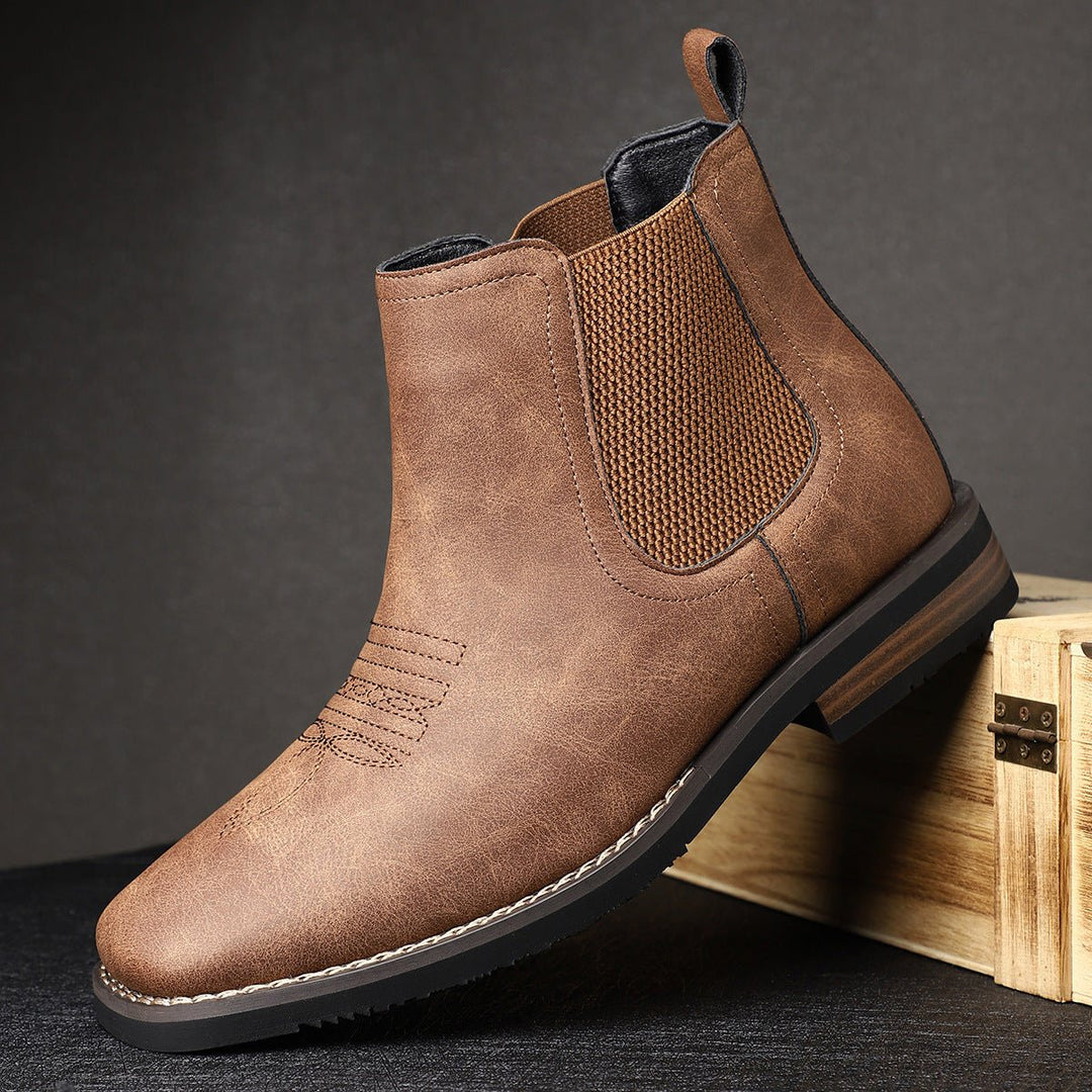 Men's brown Chelsea ankle boots with elastic side panels and low heels
