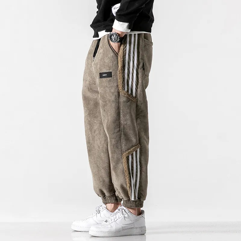Men's jogger pants with contrasting side stripes and elastic cuffs